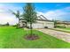 Charming home with a three-car garage and brick-paved driveway at 17898 Cherished Loop, Bradenton, FL 34211