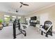 Resident gym featuring weight machines, free weights and a mirrored wall for exercise at 17898 Cherished Loop, Bradenton, FL 34211