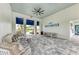 Inviting lounge area with modern furniture, stylish flooring, and a view of the community landscape at 17898 Cherished Loop, Bradenton, FL 34211