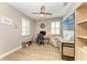Bright office featuring wood floors, computer, built-in shelving, and natural lighting at 17898 Cherished Loop, Bradenton, FL 34211