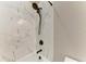 Shower featuring new fixtures and marble tile at 17898 Cherished Loop, Bradenton, FL 34211