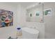 Elegant bathroom featuring a standalone tub and glass-enclosed walk-in shower at 1954 Goldenrod St, Sarasota, FL 34239