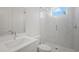 Modern bathroom featuring a glass-enclosed shower and sleek fixtures at 1954 Goldenrod St, Sarasota, FL 34239