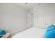 Bright bedroom with a neutral color palette, carpet, and a streamlined design at 1954 Goldenrod St, Sarasota, FL 34239