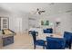 Spacious bonus room with seating, game table and shuffleboard perfect for Gathering entertainment at 1954 Goldenrod St, Sarasota, FL 34239