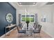 Chic dining room with stylish lighting, seating for six, and elegant decor at 1954 Goldenrod St, Sarasota, FL 34239