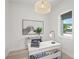 Bright home office with modern decor, zebra art, and natural light from the window at 1954 Goldenrod St, Sarasota, FL 34239
