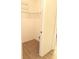 Clean and organized walk-in closet with wire shelving and wood-look tile floors at 20170 Tralee Dr, Port Charlotte, FL 33952