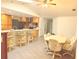 Open floor plan showcasing the kitchen with granite counters and seating at the bar at 20170 Tralee Dr, Port Charlotte, FL 33952