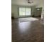 Inviting living room featuring tile floors, natural light, and tasteful decor at 20170 Tralee Dr, Port Charlotte, FL 33952