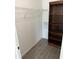Functional walk-in closet with custom shelving for optimal storage and organization at 20170 Tralee Dr, Port Charlotte, FL 33952