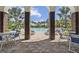 Covered seating area overlooking the pool, showcasing the resort-style amenities of the community at 208 Ariano Ave, Nokomis, FL 34275