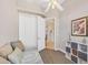 Bonus room featuring closet, neutral palette, and view to hallway at 2085 Mattamy Ct, Venice, FL 34292