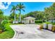 Community pool area showcasing a well-maintained parking lot and convenient mailbox access at 2085 Mattamy Ct, Venice, FL 34292