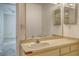Bathroom featuring a single sink vanity with a connecting door to a bedroom in the background at 222 Beach Rd # 7, Sarasota, FL 34242