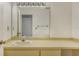 Bathroom features a spacious vanity with a large mirror and updated fixtures at 222 Beach Rd # 7, Sarasota, FL 34242