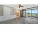 Bright bedroom features custom built-ins and access to ensuite bathroom and balcony at 222 Beach Rd # 7, Sarasota, FL 34242