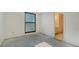 Bright bedroom with a window and access to an ensuite bathroom with ample counter space at 222 Beach Rd # 7, Sarasota, FL 34242