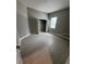 Bright bedroom with closet and window with modern finishes, providing a serene atmosphere at 24827 Buckingham Way, Port Charlotte, FL 33980