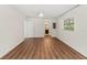 Bedroom with laminate flooring and a bathroom walkthrough at 2515 Huntington Ave, Sarasota, FL 34232
