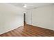 Bedroom with laminate flooring and an ensuite bathroom at 2515 Huntington Ave, Sarasota, FL 34232