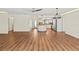 Spacious open floor plan featuring modern lighting, flooring, and a view of the kitchen area at 2515 Huntington Ave, Sarasota, FL 34232
