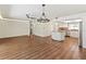 Spacious open floor plan featuring modern lighting, flooring, and a view of the kitchen area at 2515 Huntington Ave, Sarasota, FL 34232