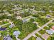 Fantastic aerial view showcasing the neighborhood's lush landscaping at 2546 Malibu Ln, North Port, FL 34286