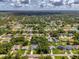 Wonderful aerial view of the community and a single Gathering home with lots of vegetation at 2546 Malibu Ln, North Port, FL 34286