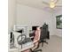 A bedroom with ceiling fan and a window, and with gaming computer setups at 2546 Malibu Ln, North Port, FL 34286