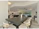 Dining room showcases open layout with kitchen and living spaces, perfect for entertaining at 2546 Malibu Ln, North Port, FL 34286
