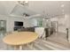 Open living space featuring modern kitchen, comfortable living area, and a dining area perfect for entertaining at 2546 Malibu Ln, North Port, FL 34286