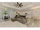 Open-concept living room featuring a modern design, spacious layout and beautiful wood flooring at 2546 Malibu Ln, North Port, FL 34286