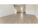 The space is bright and open, featuring light tile floors, recessed lighting, and a neutral color palette at 317 Via Tuscany Ave, Sarasota, FL 34243