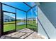 Relax on the screened patio with views of a serene pond, enhancing the home's appeal at 317 Via Tuscany Ave, Sarasota, FL 34243