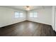 Bright bedroom with ample natural light and wood flooring at 3222 Sycamore Ter, Sarasota, FL 34237