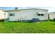 Charming single-story home featuring a well-maintained lawn at 3222 Sycamore Ter, Sarasota, FL 34237