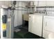 Functional laundry area with washer, dryer, and water heater at 3222 Sycamore Ter, Sarasota, FL 34237