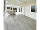 Covered patio featuring a dining set, ideal for outdoor relaxation and entertainment at 3222 Sycamore Ter, Sarasota, FL 34237