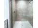 Updated bathroom with a spacious walk-in shower and frameless glass enclosure at 3222 Sycamore Ter, Sarasota, FL 34237