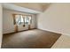 Bedroom with carpet, neutral walls, and a window with sheer curtains at 3311 39Th W Pl, Bradenton, FL 34205