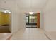 The dining room features neutral tile flooring and sliding doors to the screened in lanai at 3311 39Th W Pl, Bradenton, FL 34205