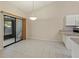 Empty dining room with sliding glass door and tile flooring at 3311 39Th W Pl, Bradenton, FL 34205