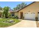 Charming single Gathering home featuring a well-maintained lawn and attached one car garage at 3311 39Th W Pl, Bradenton, FL 34205
