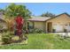 Charming single Gathering home featuring a well-maintained lawn and attached one car garage at 3311 39Th W Pl, Bradenton, FL 34205