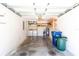 Spacious garage with laundry, water heater, shelving, and extra storage at 3311 39Th W Pl, Bradenton, FL 34205