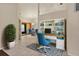 Bright home office space with built-in shelving, desk and comfortable seating at 3311 39Th W Pl, Bradenton, FL 34205