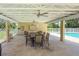 Outdoor seating area and pool with covered pavilion at 3311 39Th W Pl, Bradenton, FL 34205