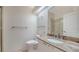 Bathroom featuring granite countertop vanity, glass shelves, and a shower at 3317 Highlands Bridge Rd # 61, Sarasota, FL 34235