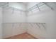 Walk-in closet with metal shelving providing ample storage space at 3317 Highlands Bridge Rd # 61, Sarasota, FL 34235
